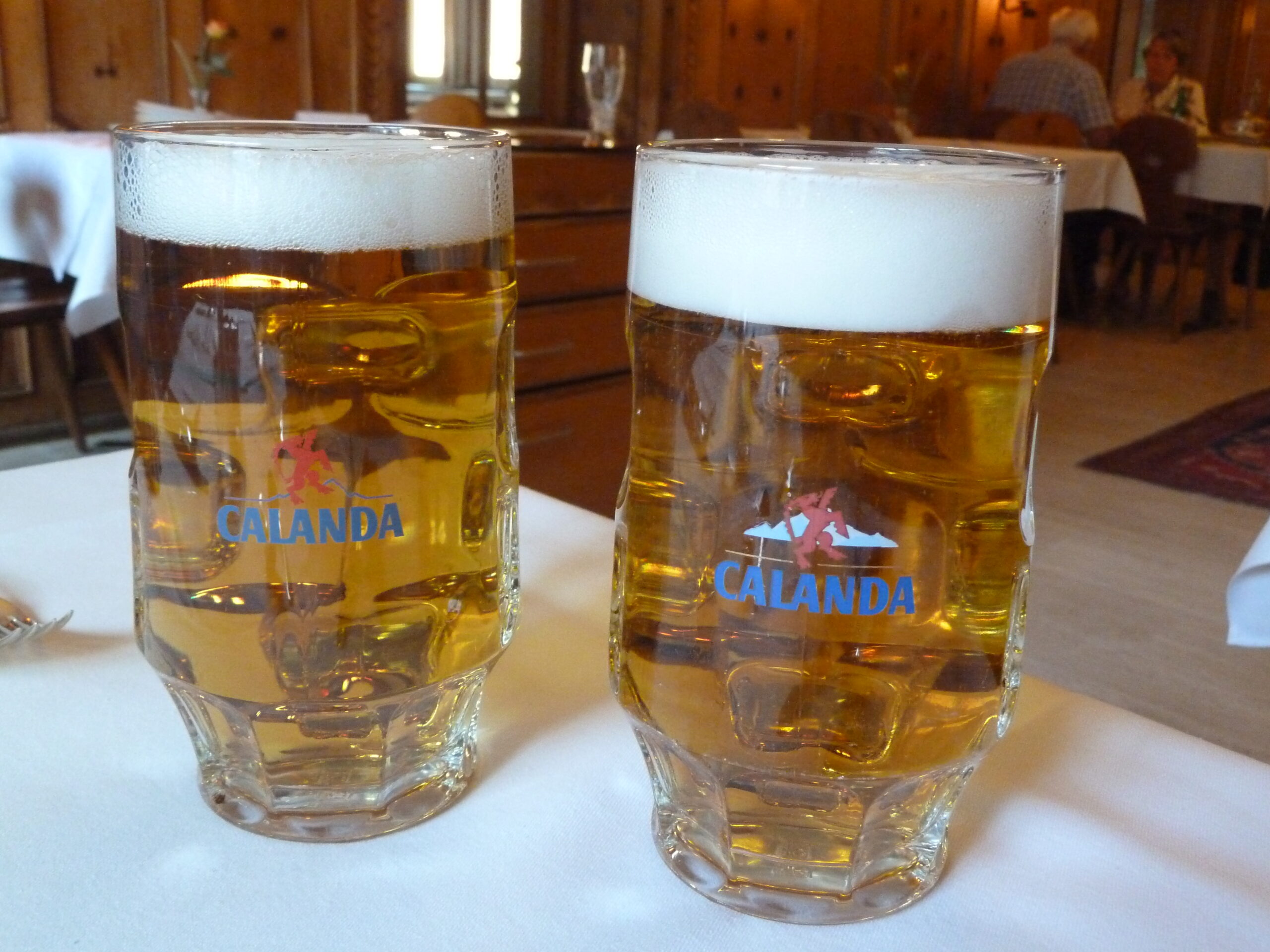 Two glasses of Calanda beer at a restaurant in Switzerland